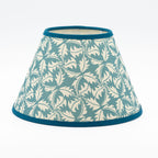 Large Dandelion lampshade in blue — dandelion seedhead pattern on a handmade conical paper shade.