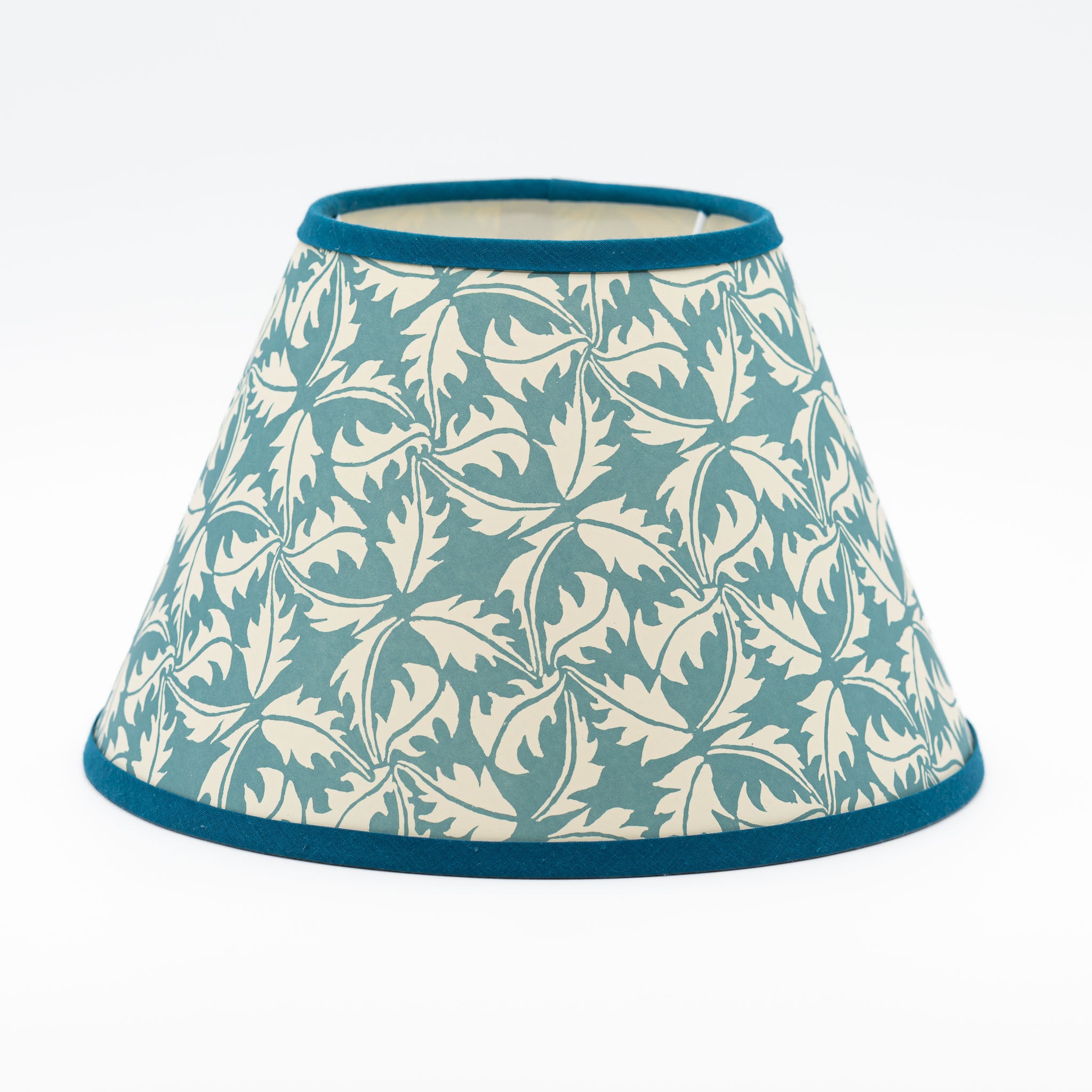 Large Dandelion lampshade in blue — dandelion seedhead pattern on a handmade conical paper shade.
