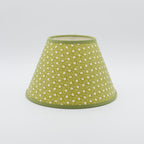Animalcules lampshade in green — scattered organic speckle pattern on a handmade conical paper shade.