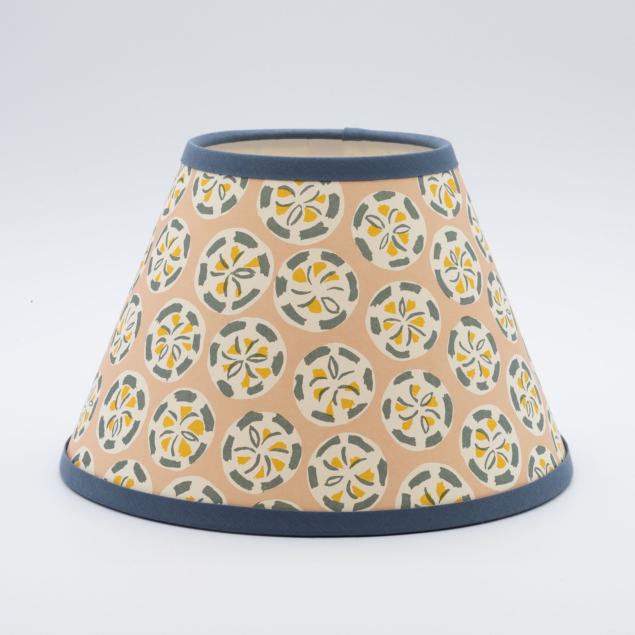 Charleston Roundel lampshade — hand-painted roundel motif in soft multicolour on a conical paper shade.
