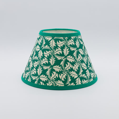 Dandelion lampshade in bottle green — dandelion seedhead pattern on a handmade conical paper shade.