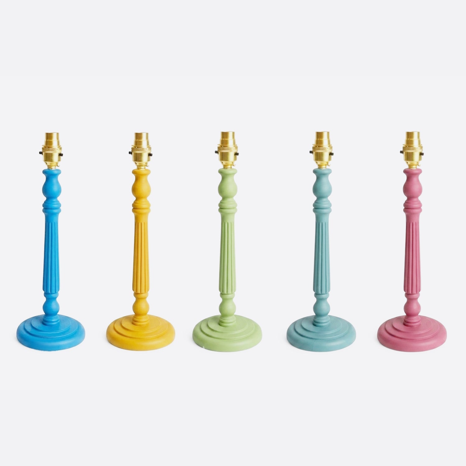 Painted wooden table lamp bases, alternate view — coming soon.