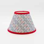 Persephone Cornflower lampshade — cornflower-blue floral sprig pattern on a conical paper shade.