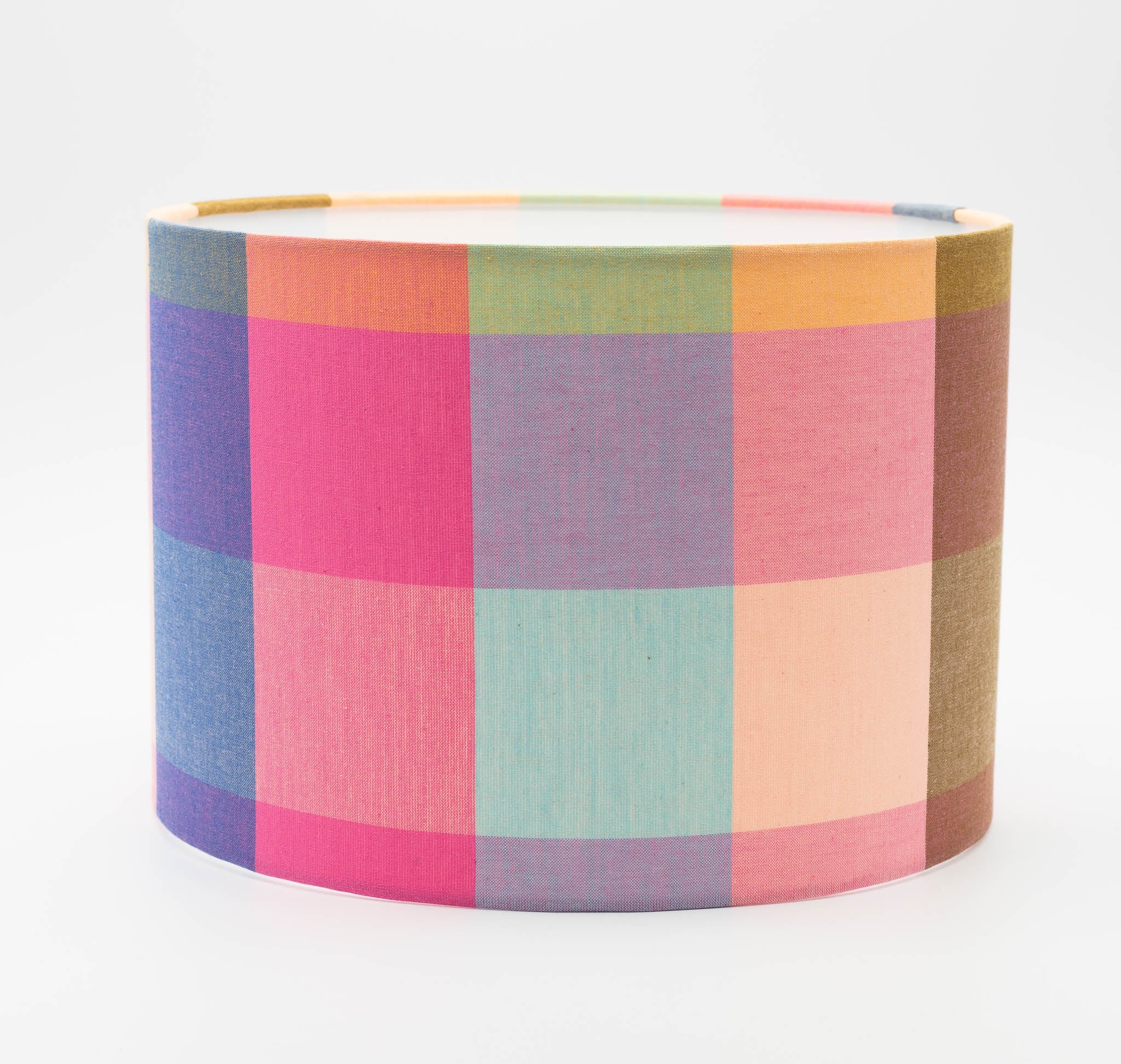 Summer Squares lampshade — bright pink and blue geometric check on a cotton drum shade.