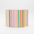 Summer Stripes lampshade — multicolour striped pattern on a cotton drum shade.